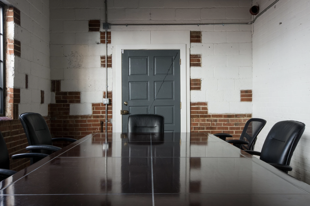 Photo of large desk in conference room