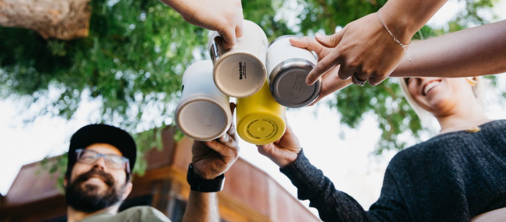 A coworking coffee cheers